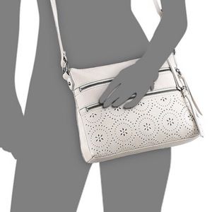 SOLD! The Sak Reseda Laser Cut Leather Crossbody NWOT!